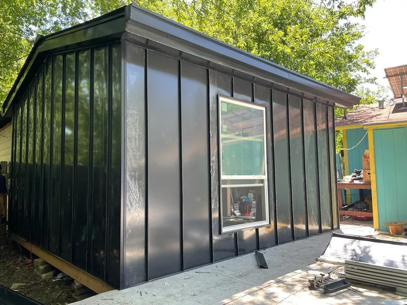 Black standing seam metal wall panels for Roof Inspection in Bainbridge Island