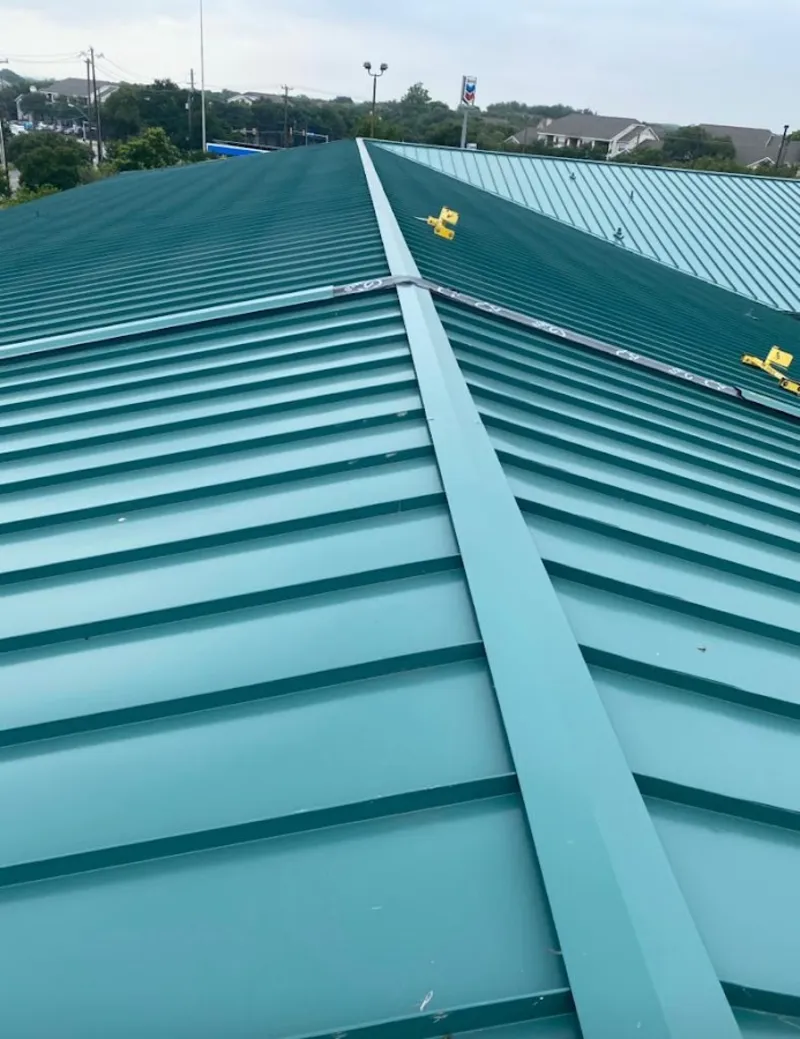 Green commercial metal roof ridge and valley for Metal Roof Repair in Bainbridge Island